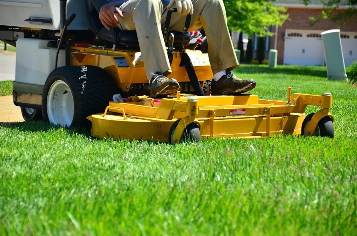 Property owner performing seasonal land maintenance tasks on rural acreage